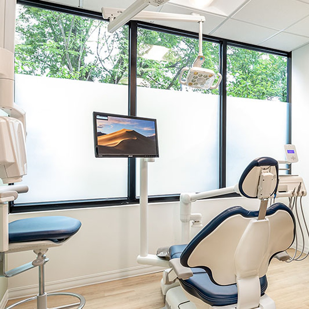 Modern dental operatory with natural light and a clean, inviting clinical feel.
